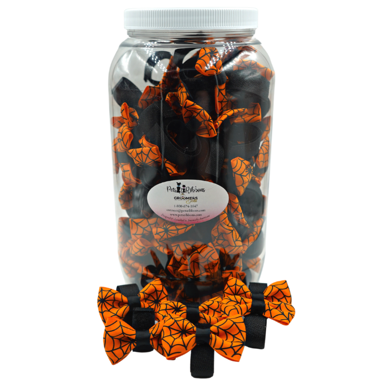 orange spiderweb dog bow on velcro fastener